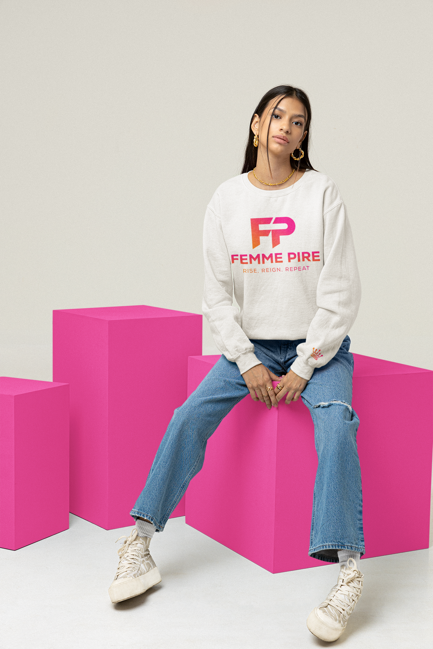 mockup-of-a-woman-wearing-a-sweatshirt-while-sitting-on-a-cube-m26182.png