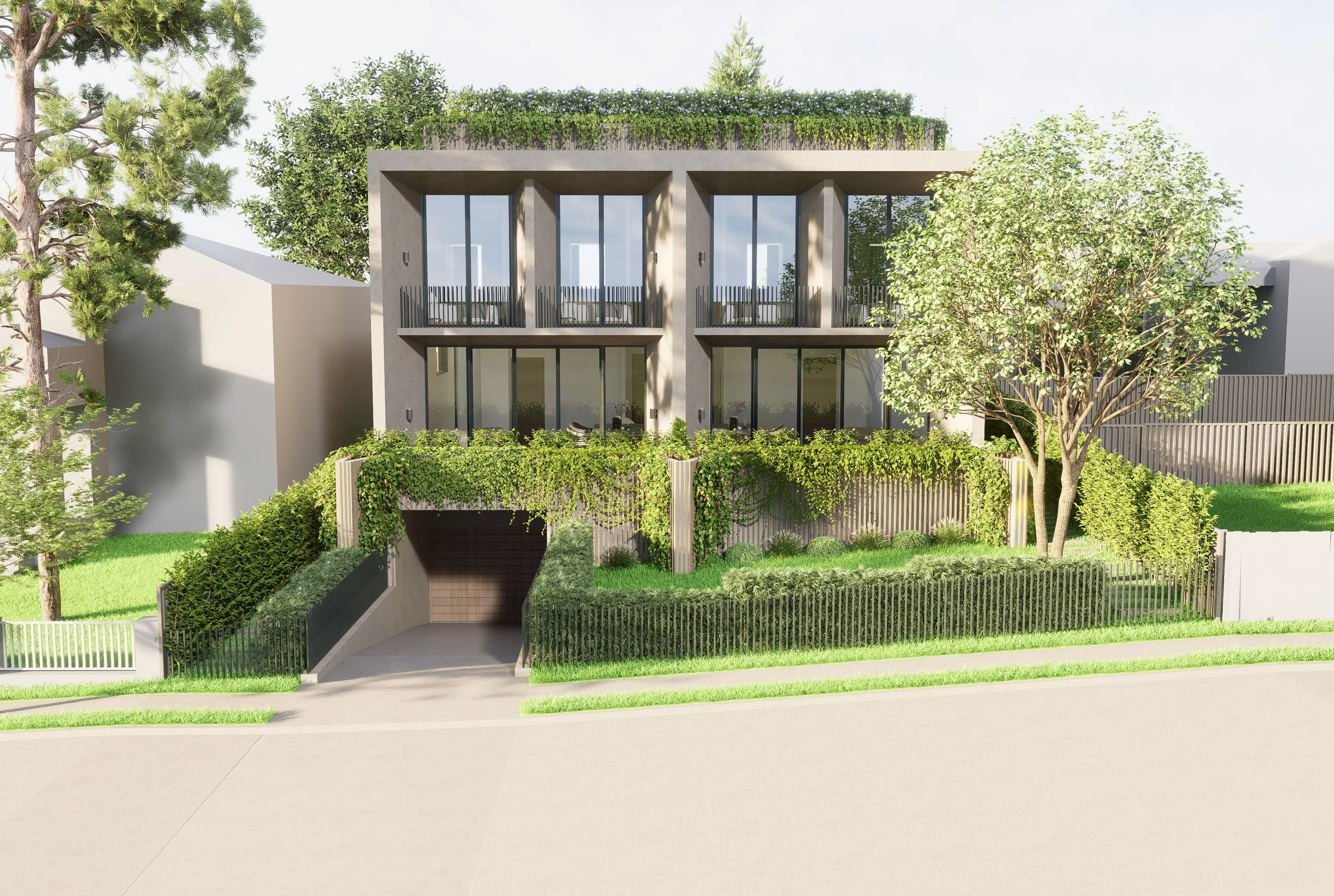 Modern two storey apartment building with basement parking.