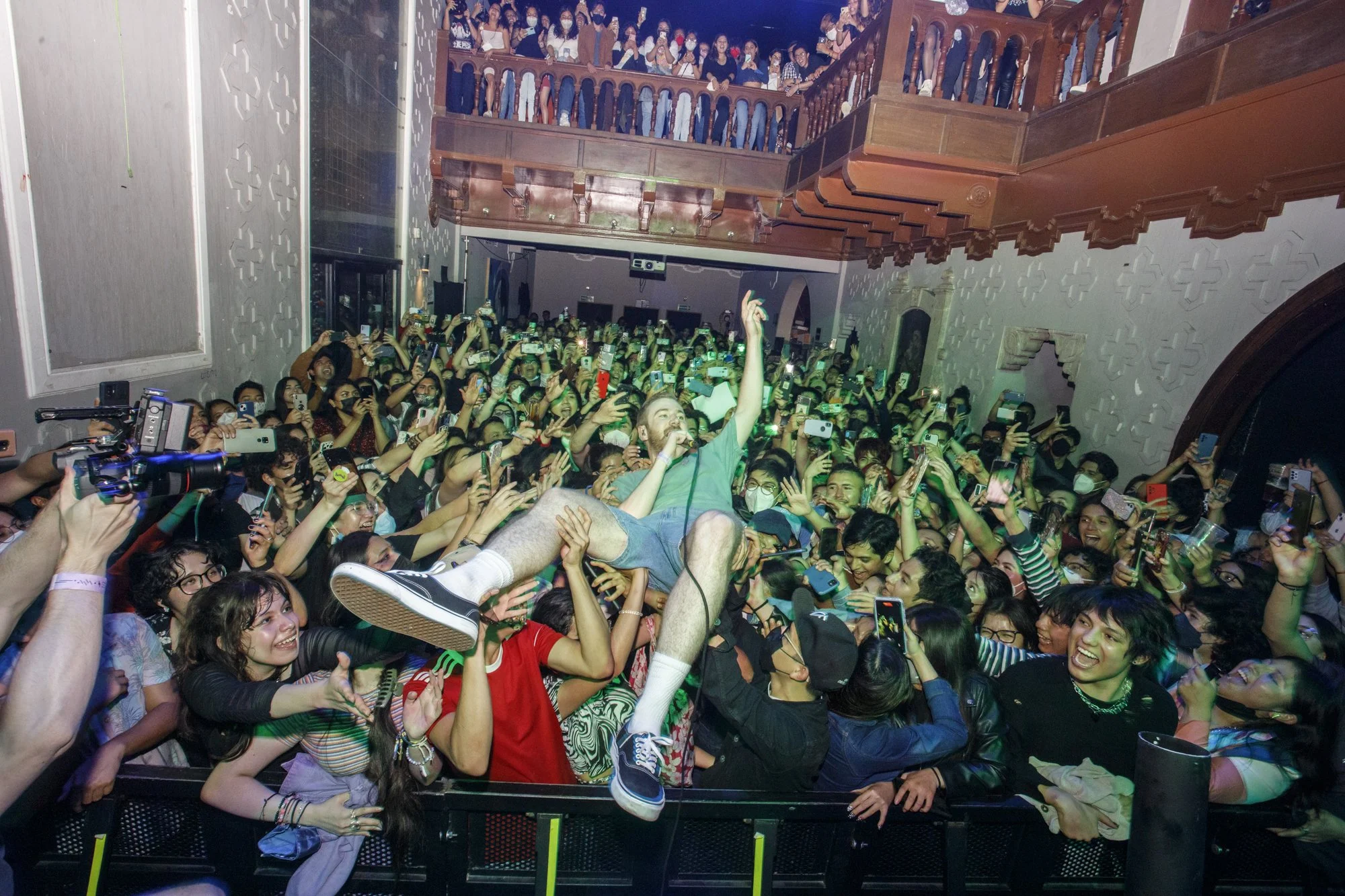 Crowdsurfing at a concert