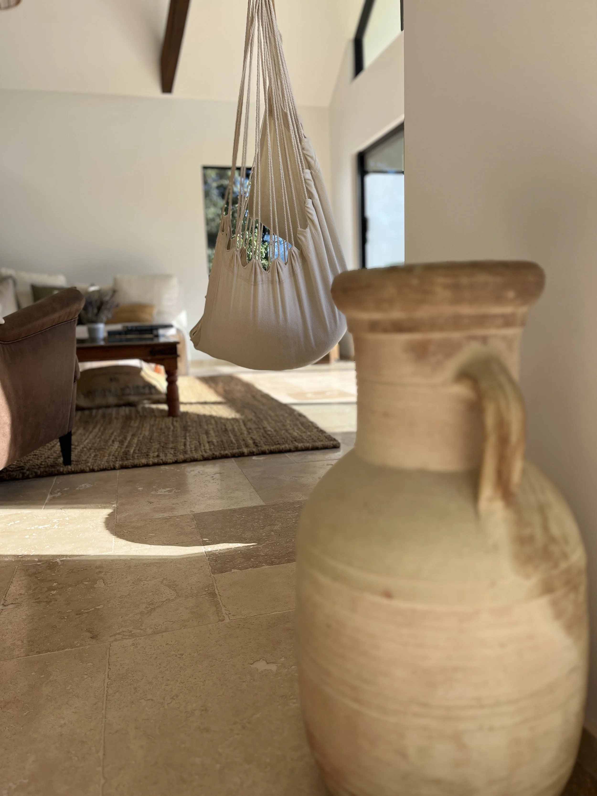 Old jar and travertine floor