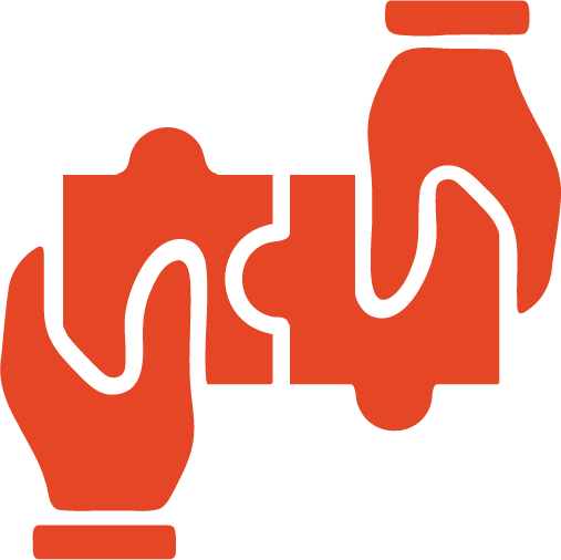 Two hands, one holding a puzzle piece and the other about to connect it