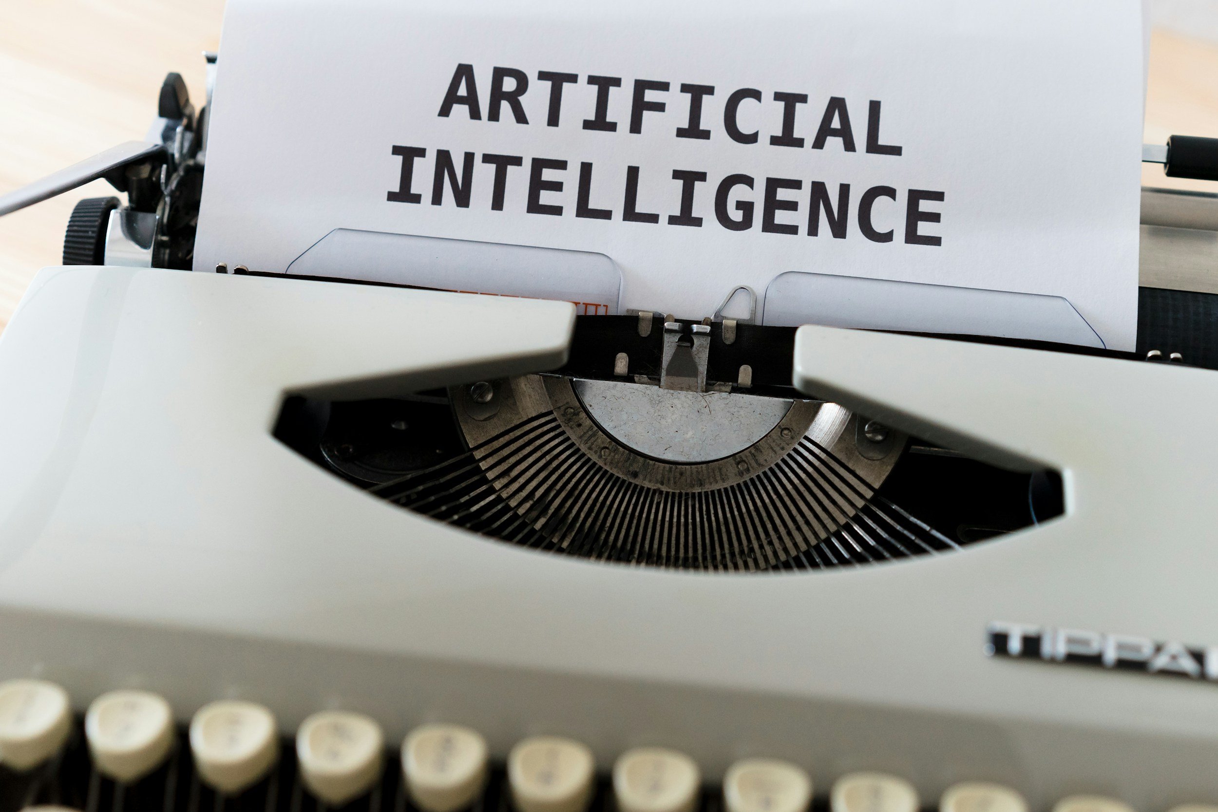 machine à écrire avec un message sur l'intelligence articielle IA