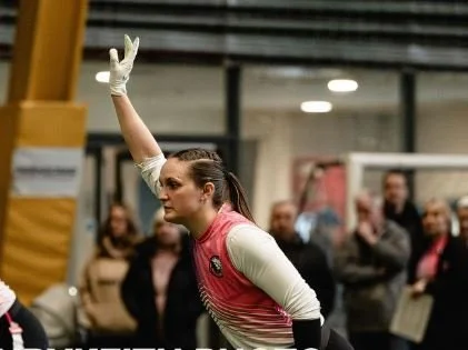A stylized logo of a panther's head in dark blue and white, with sharp lines and an open mouth.