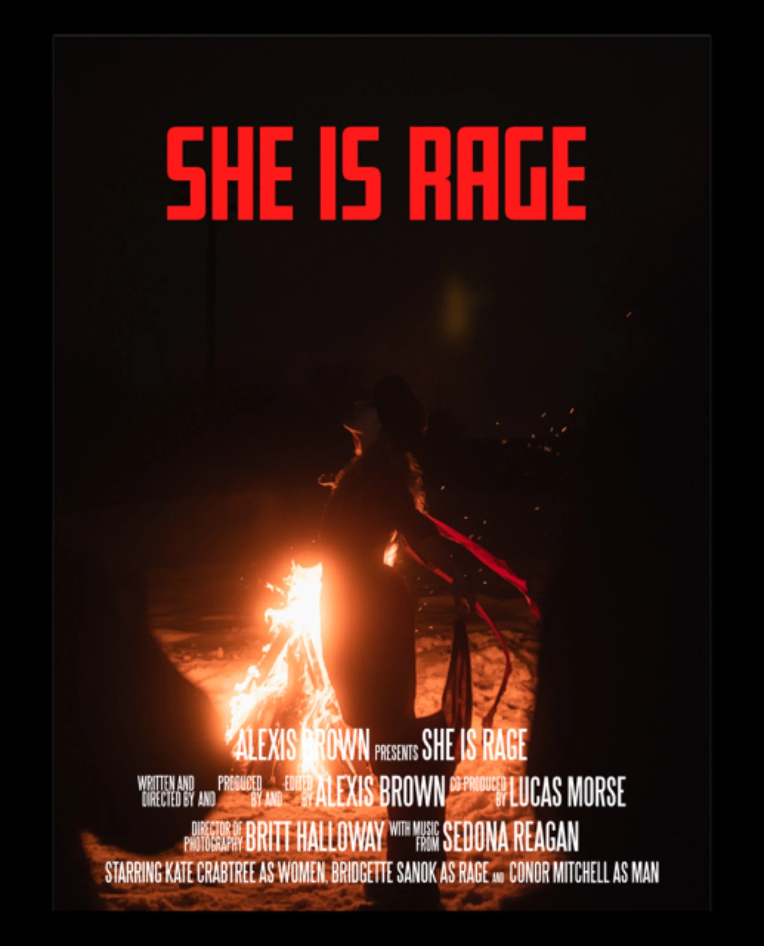 A movie poster featuring a large fire with the title 'She Is Rage' in red letters at the top, and credits listing actors Alexis Brown, Sedona Reagan, and others below the fire against a dark background.
