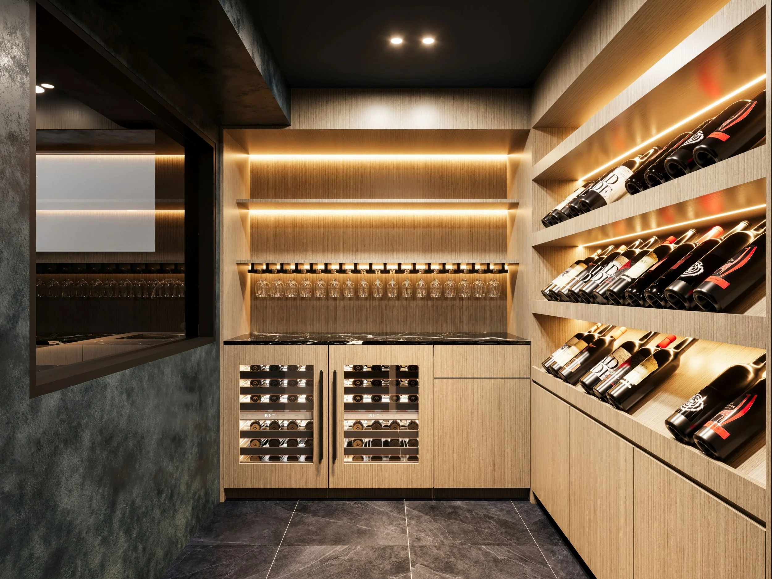 Modern wine cellar with wood shelving, bottles of wine stored on angled racks, and a glass display with wine glasses hanging upside down.