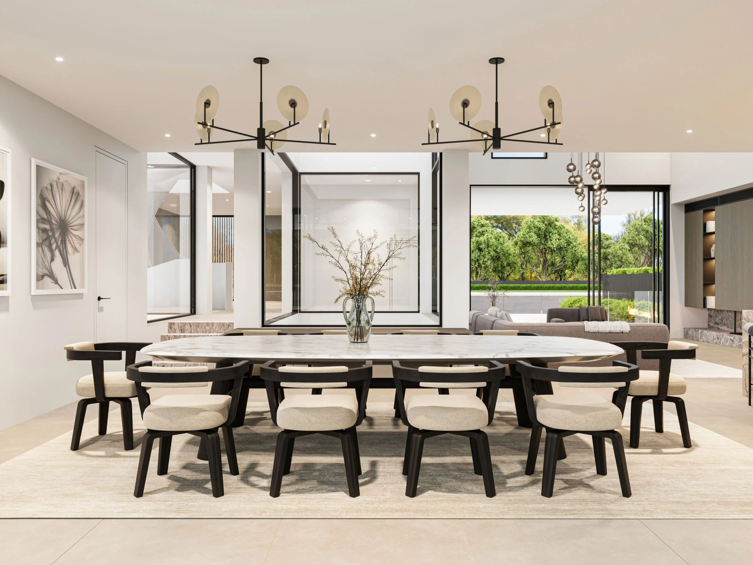 Modern dining room with marble table, nine black and beige chairs, central vase with dried branches, contemporary chandeliers, large windows with a view of greenery, neutral color palette, and additional seating area in the background.