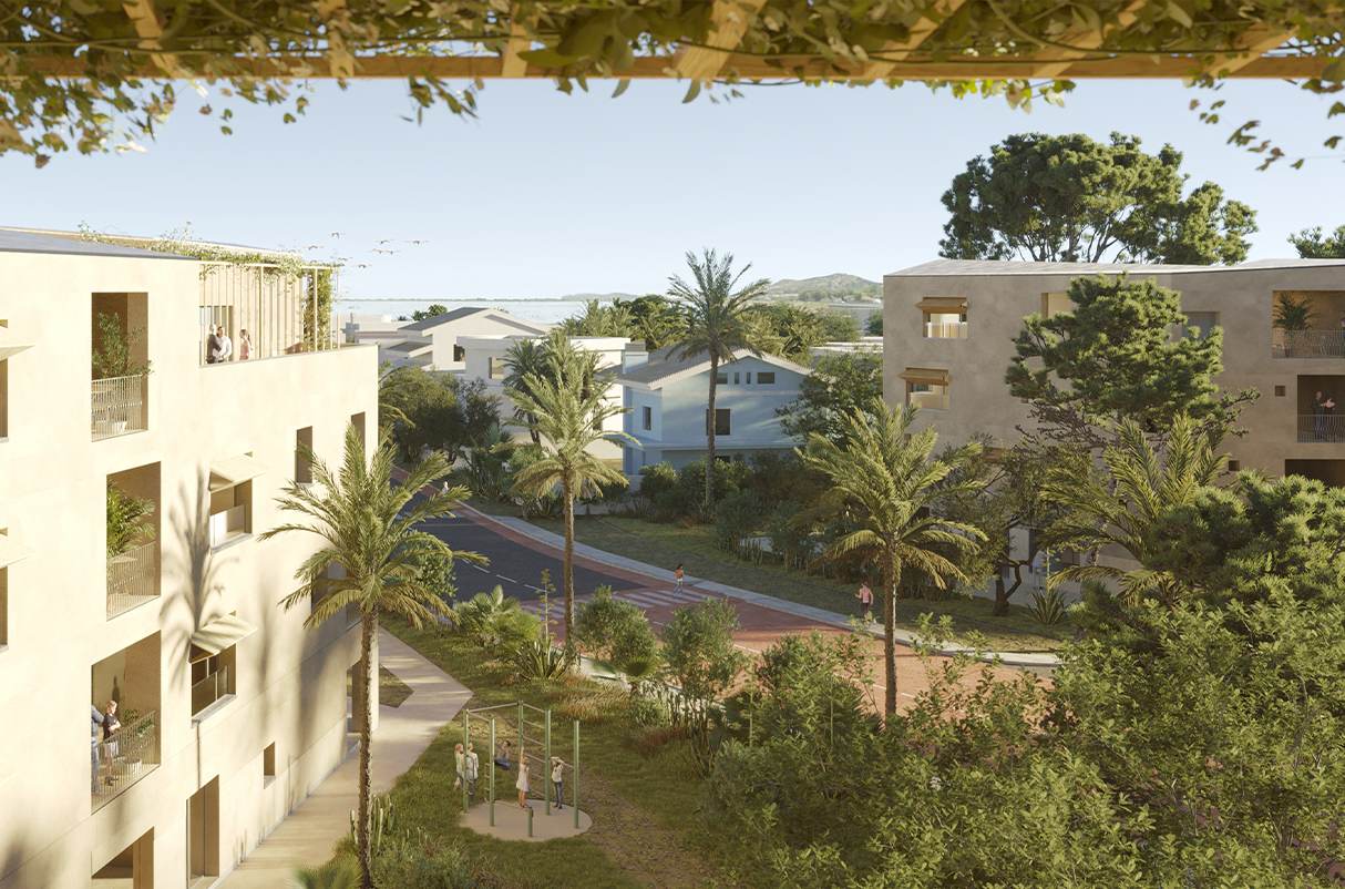 Vista de un complejo residencial con árboles, palmeras y edificios modernos de colores claros, en un día soleado con cielo despejado.