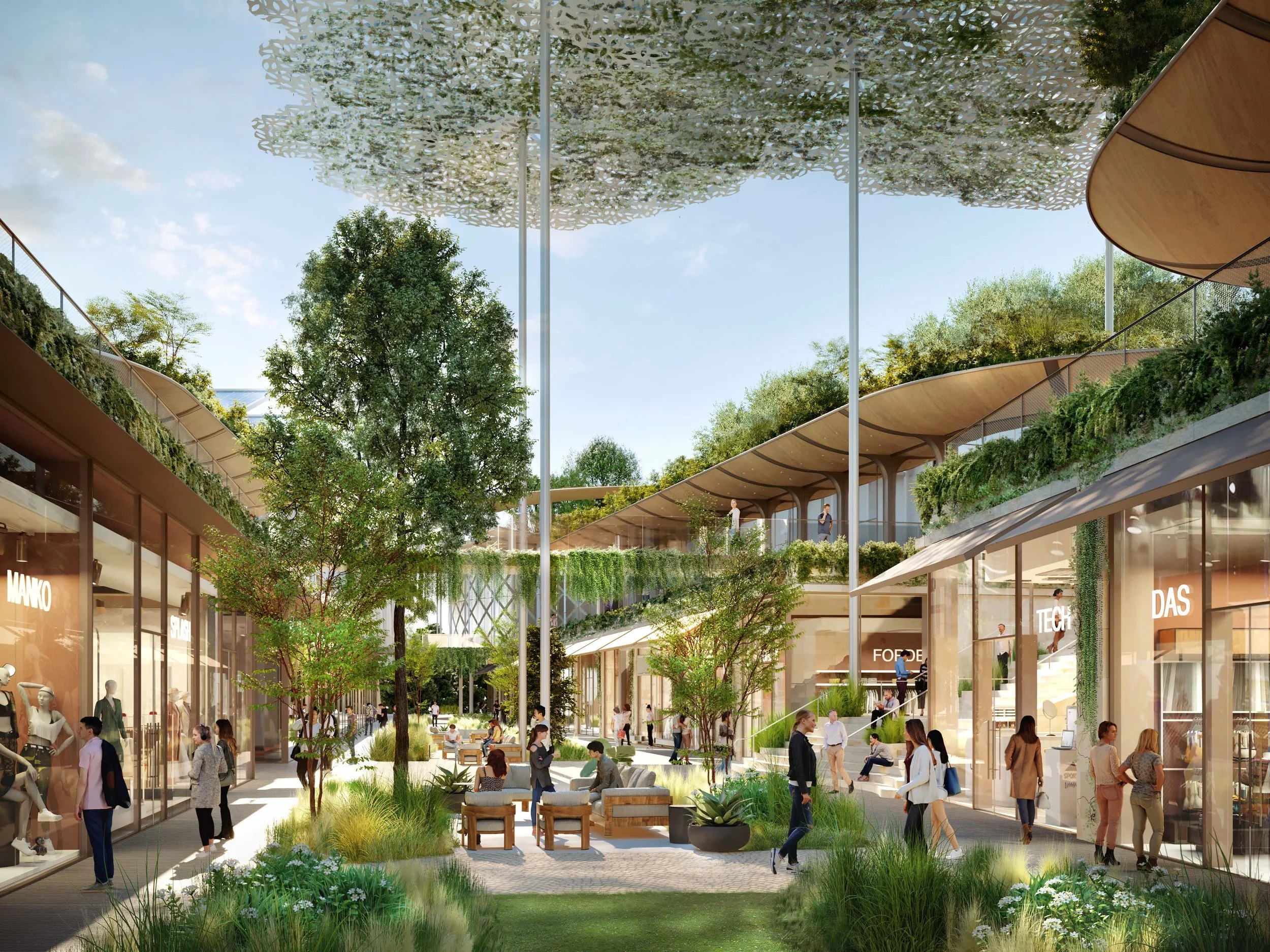 Un centro comercial moderno al aire libre con tiendas de lujo, áreas verdes y personas paseando y socializando.