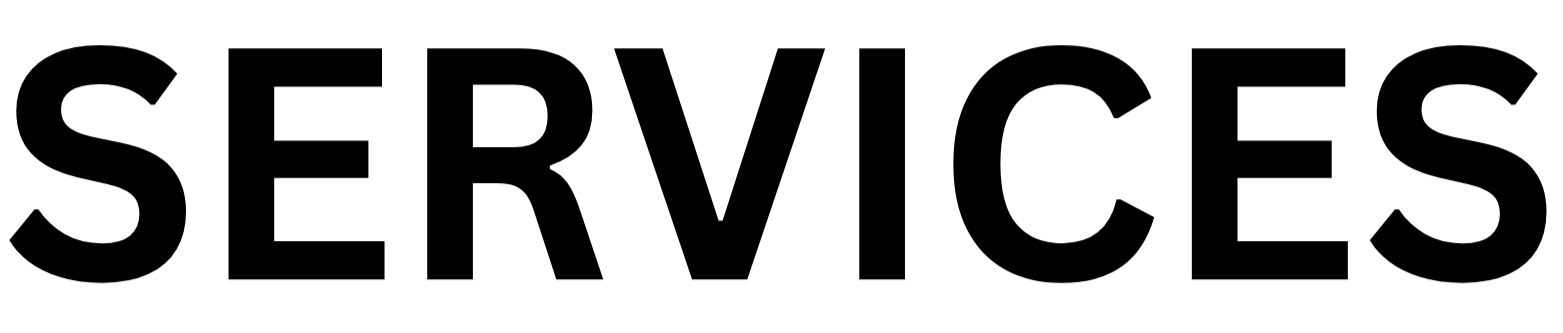 A black and white sign with the word 'SERVICES' written in large, bold, uppercase letters.