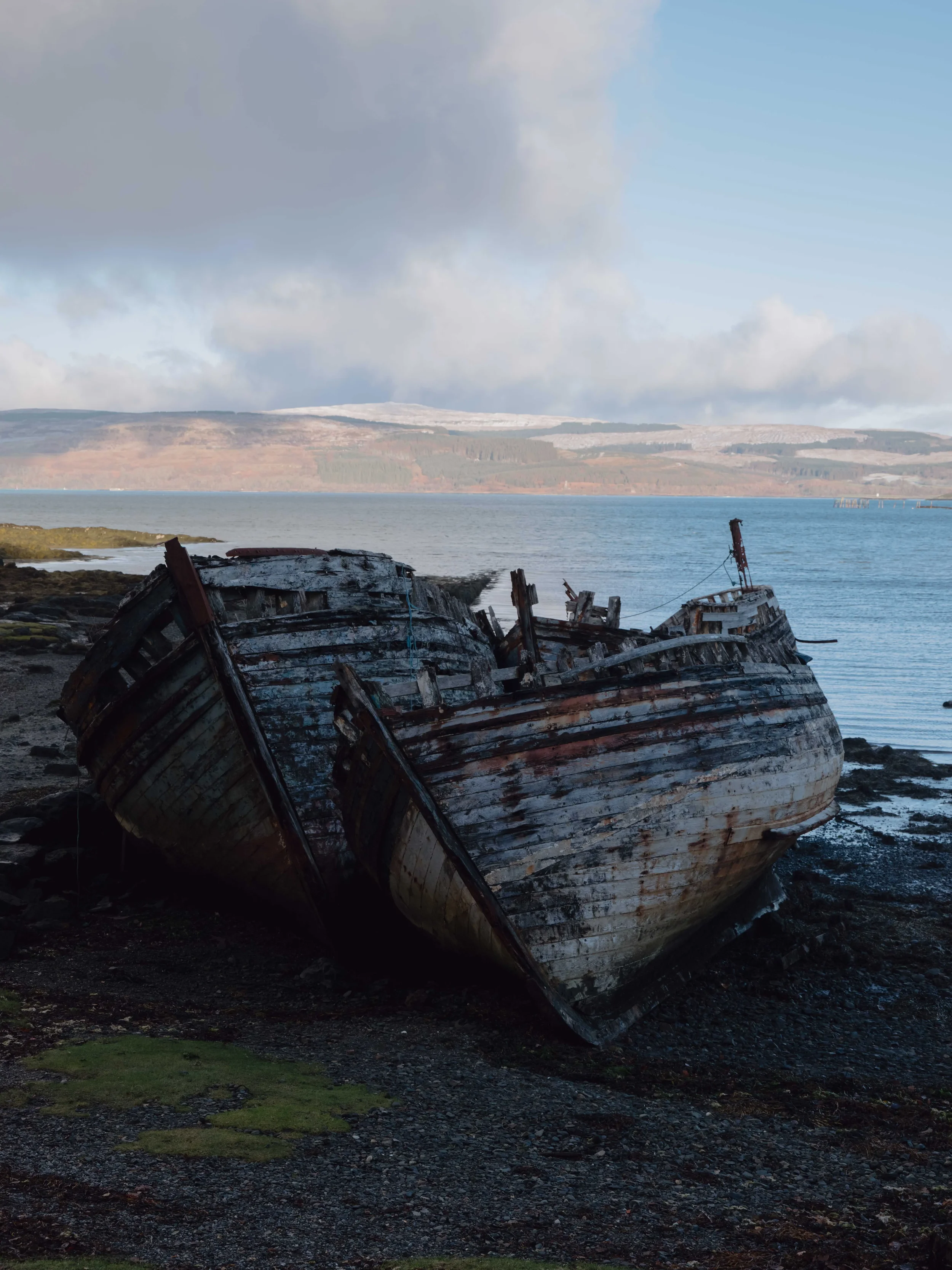 Two old boats on beach near Fort William on drive to Borradill
