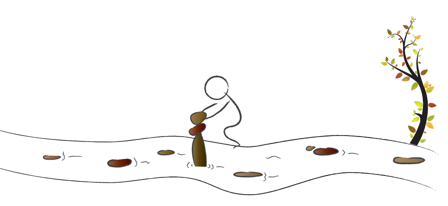 A person walking along a quiet street at night with street lamps illuminating the sidewalk and trees with colorful leaves.