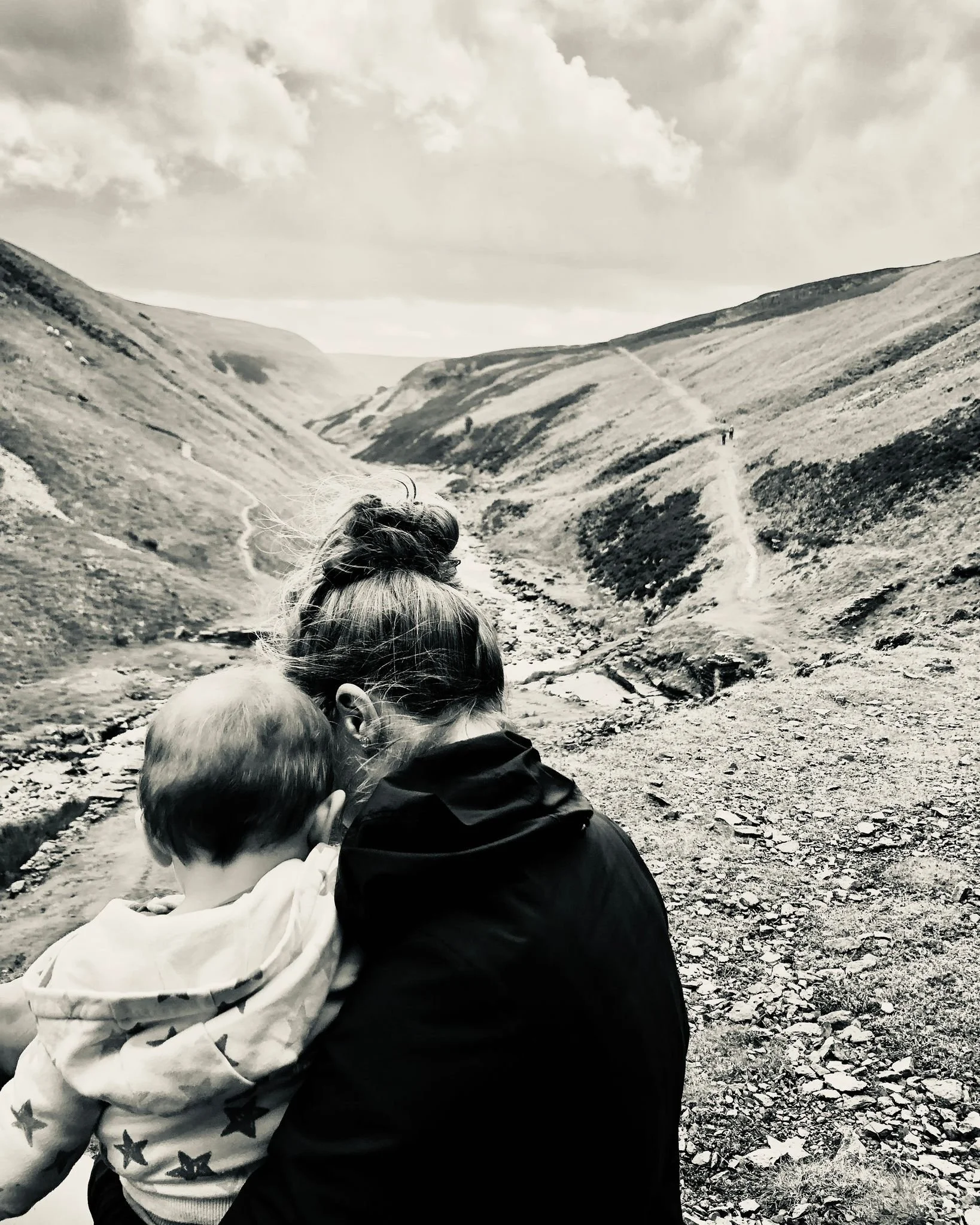 Mum and baby looking out on the journey of motherhood together