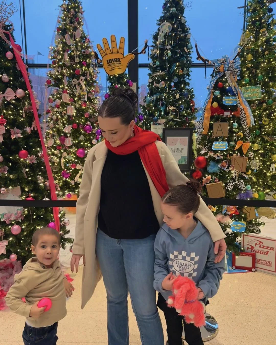 Atlas with his mother and sibling