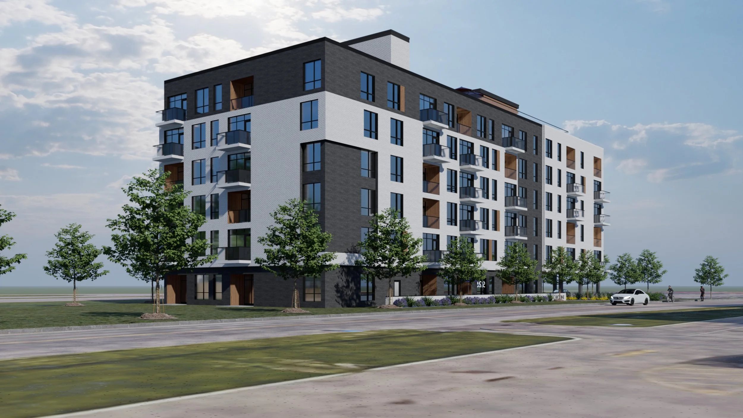 Vue extérieure du bâtiment résidentiel Le 625, un immeuble moderne à appartements à louer offrant une façade contemporaine avec balcons, un aménagement paysager soigné, ainsi que des avantages inspirés des hôtels tels qu’une salle d’entraînement