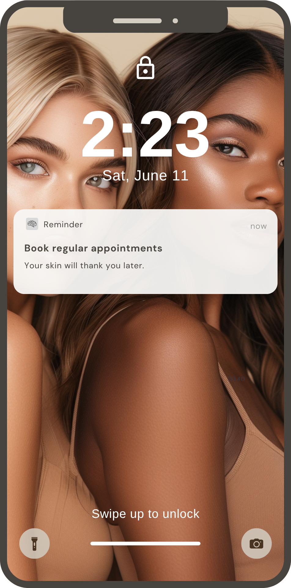 Close-up of two women with different skin tones posing together, one with blonde hair and blue eyes, the other with dark hair and brown eyes. The phone screen displays the time as 2:23 and the date as Saturday, June 11, along with a reminder to book regular skincare appointments.
