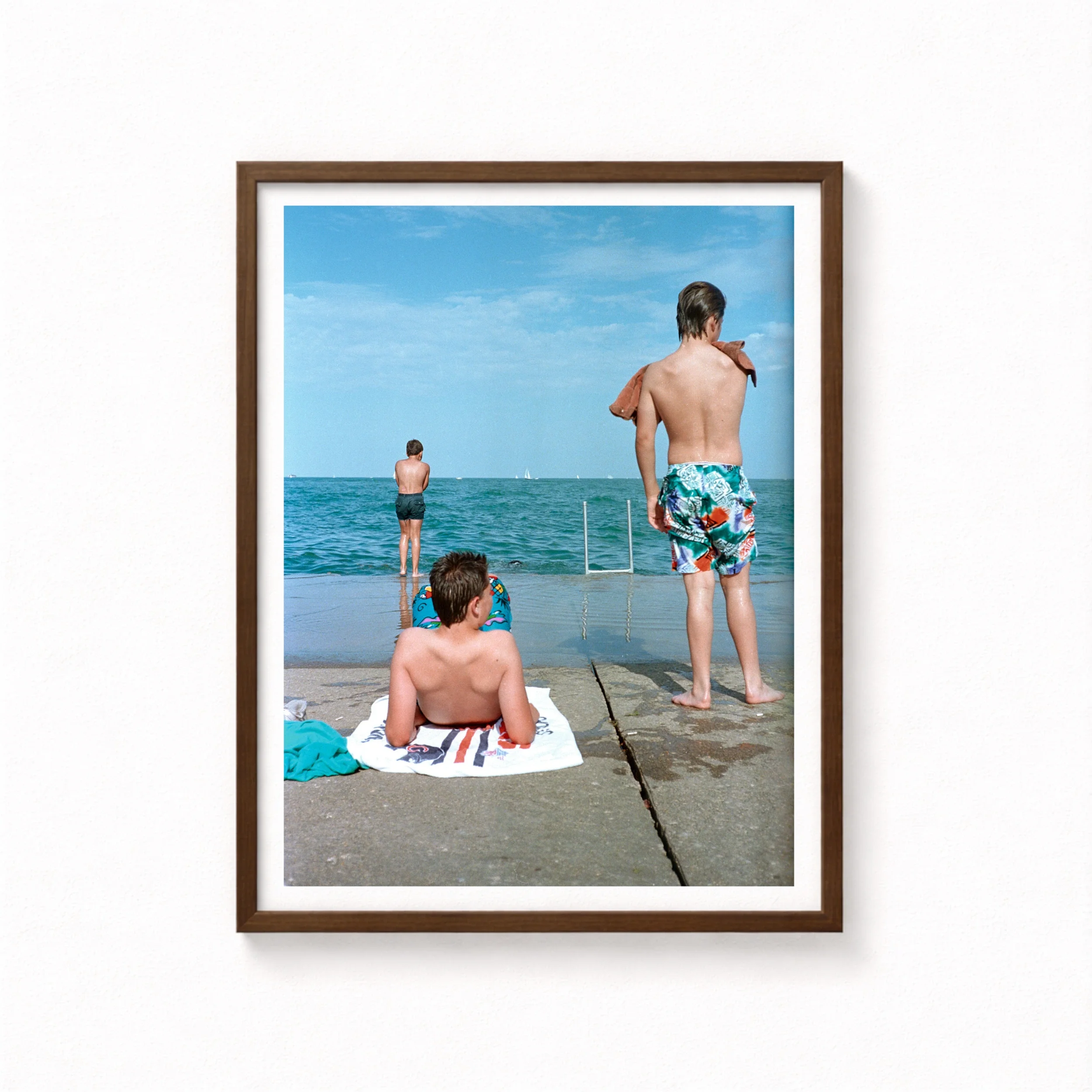 debra-hurford-brown-mockup-Boys-on-the-ledge-framed.webp