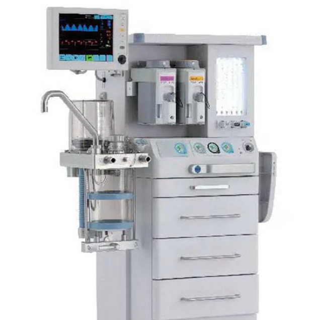 Medical anesthesia machine with monitors, gas cylinders, and control panels in a hospital setting.