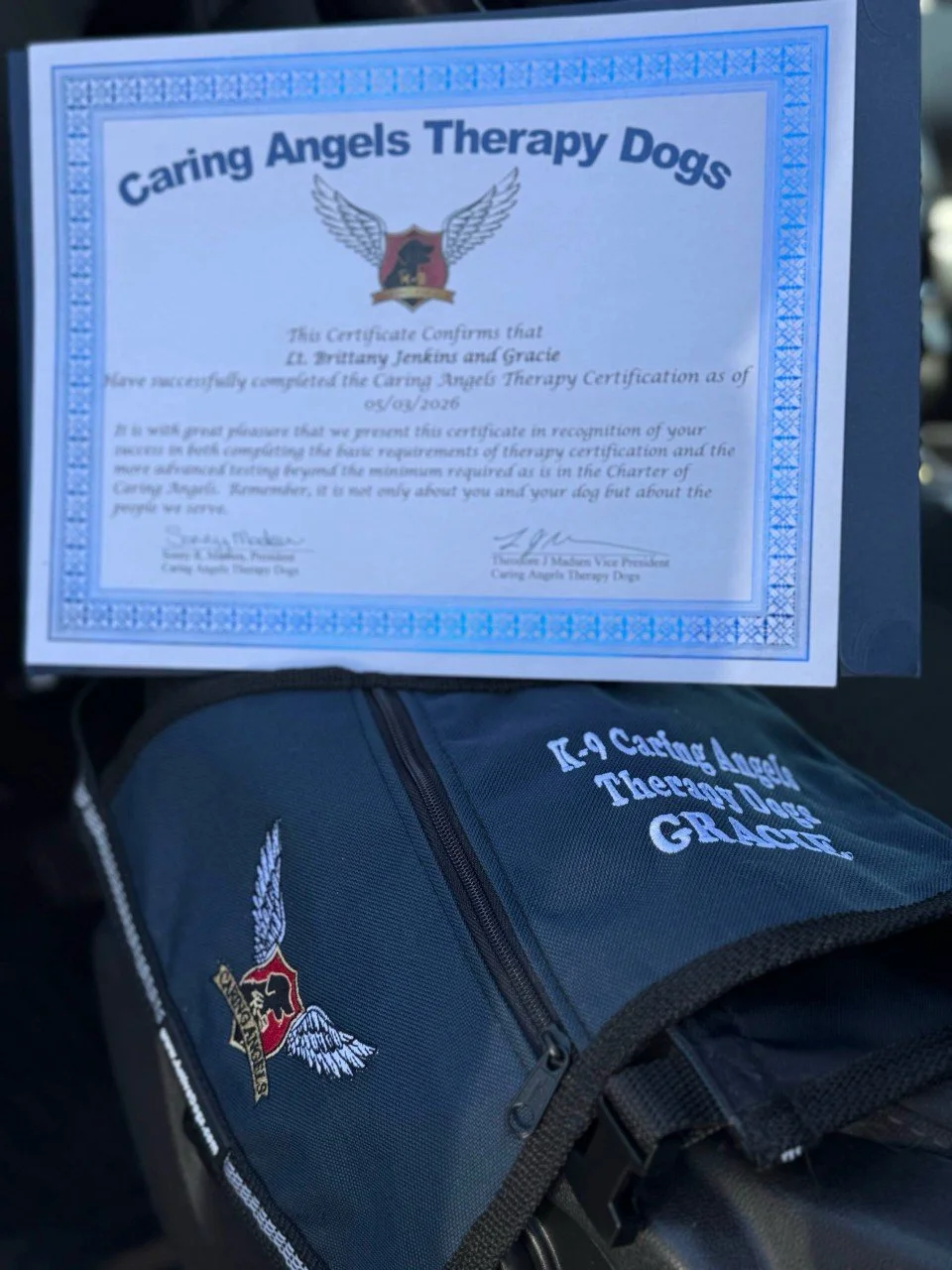 cert and vest well earned.jpg