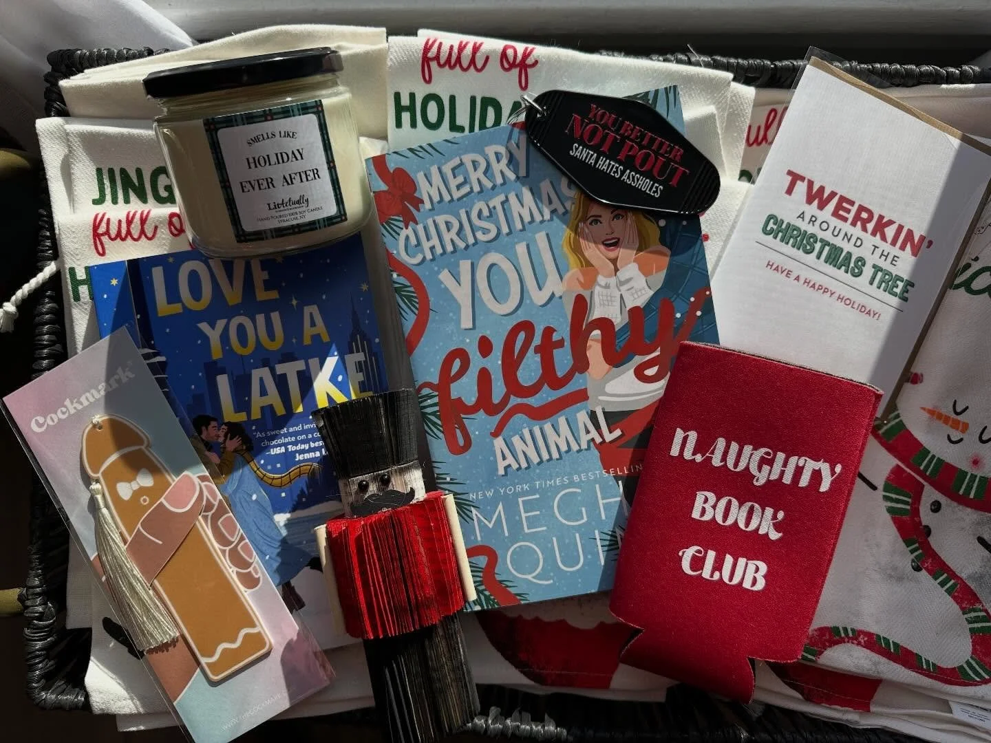 Lit Actually is stacked with books hotter than a dripping chocolate cordial cherry IYKYK. From cheeky koozies, sassy keychains, cards and pouches from @redheadedstepchildpaperco to gingerbread Cockmarks and locally sourced candles that smell like &ld