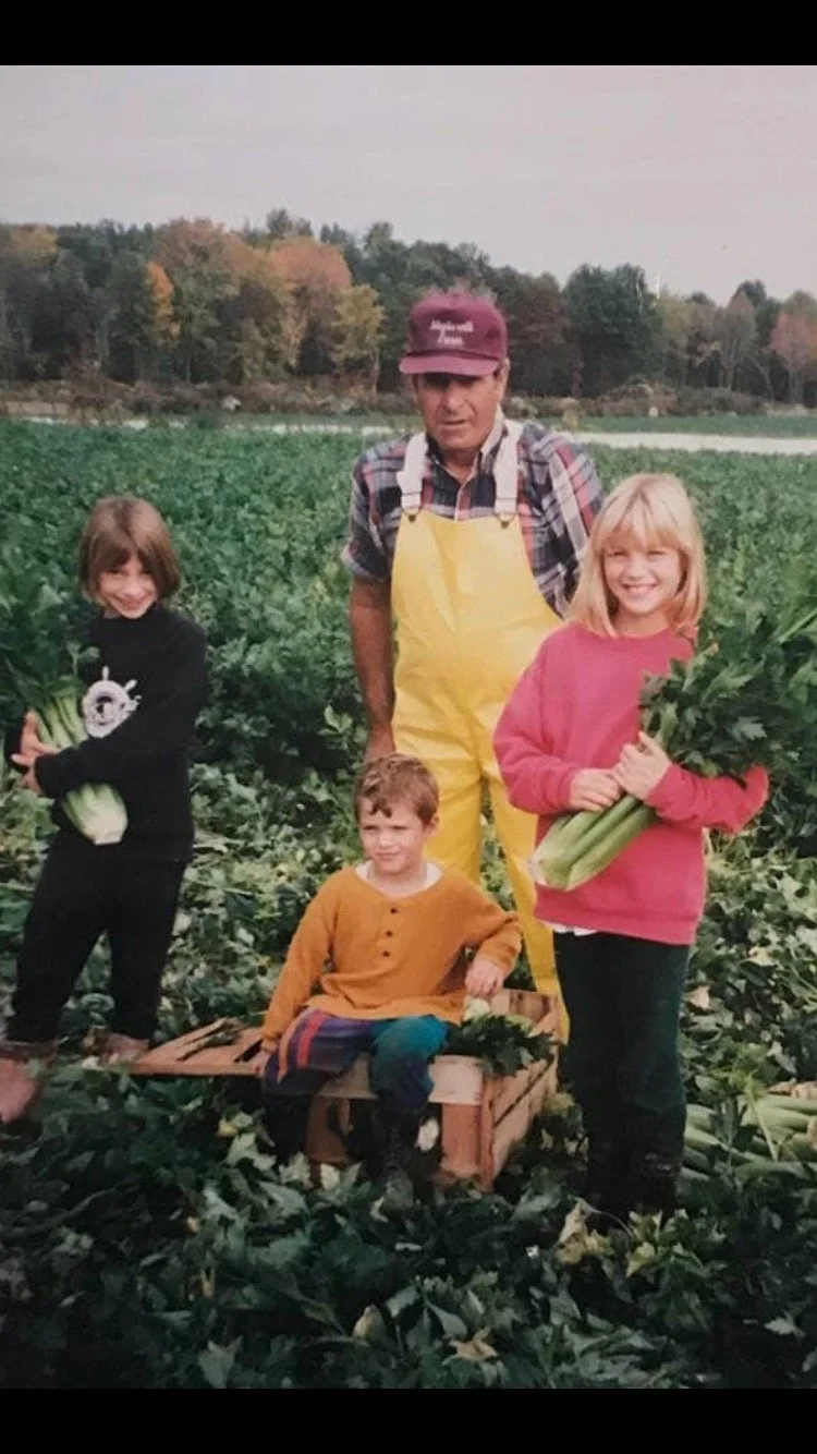 Rocco Migliorelli with Grandkids in Field