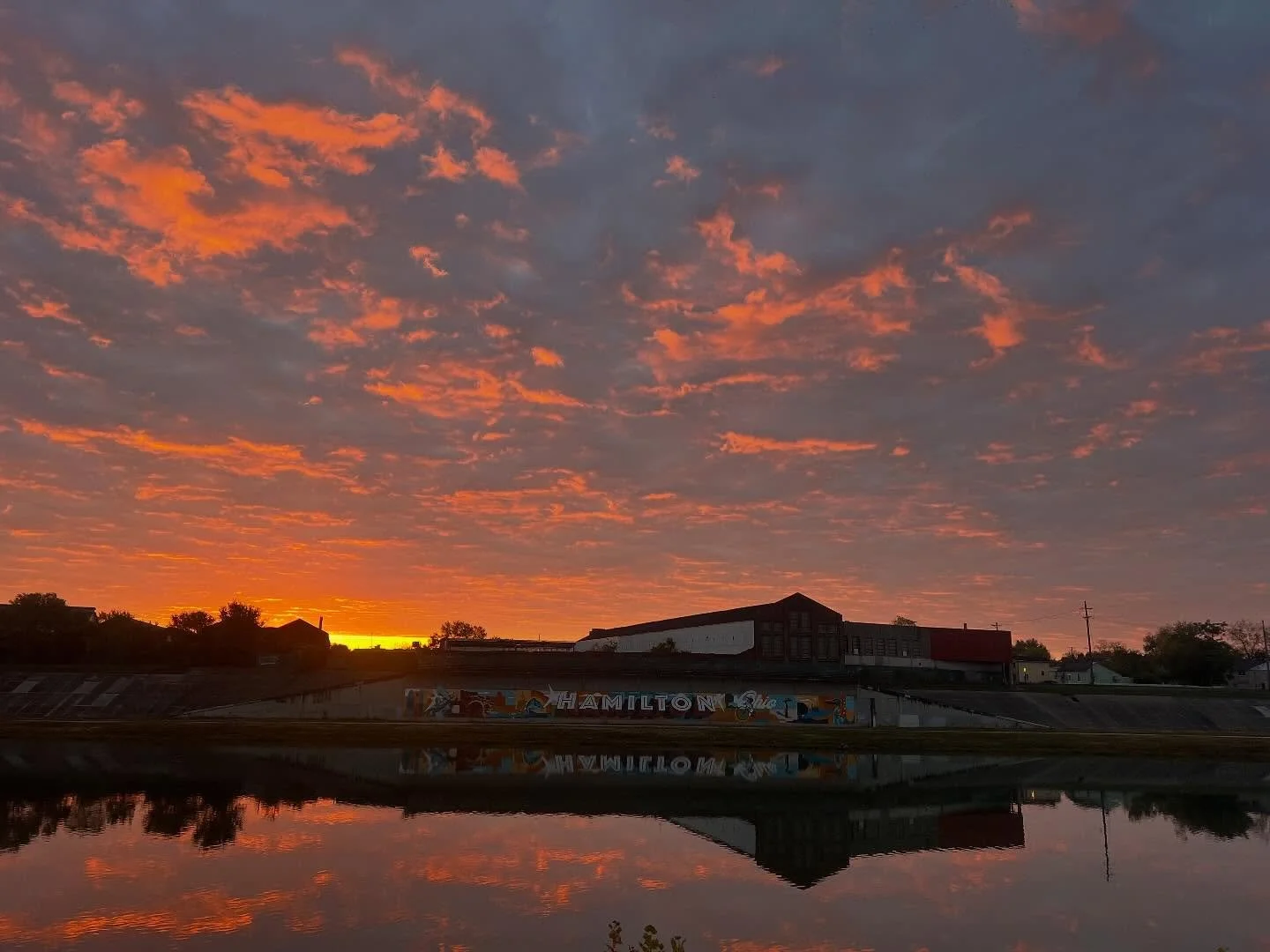 What a way to start the new month.

On our end, one of us was out the door and back from our run before the sun came up. The other got to soak in this beautiful sunrise over the @hamiltonoh (Hamilton mural in background on east side of the river).

T