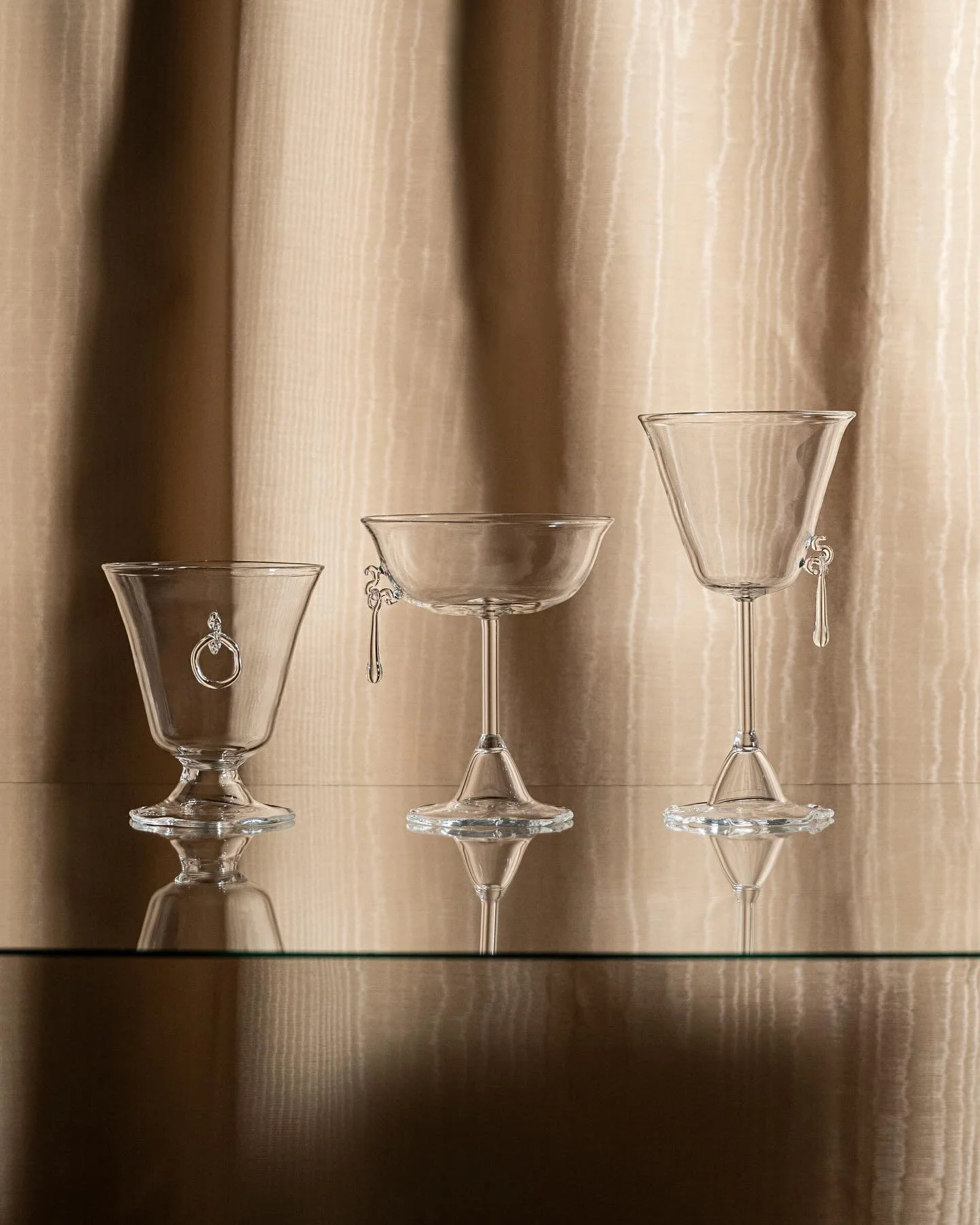 I&rsquo;ve been quietly working on something new.

SOSPESA: a collection with suspended hand-blown charms, inspired by historical fine glassware found in museum collections.

Wine glass, champagne coupe, water tumbler. Each charm formed in flame duri