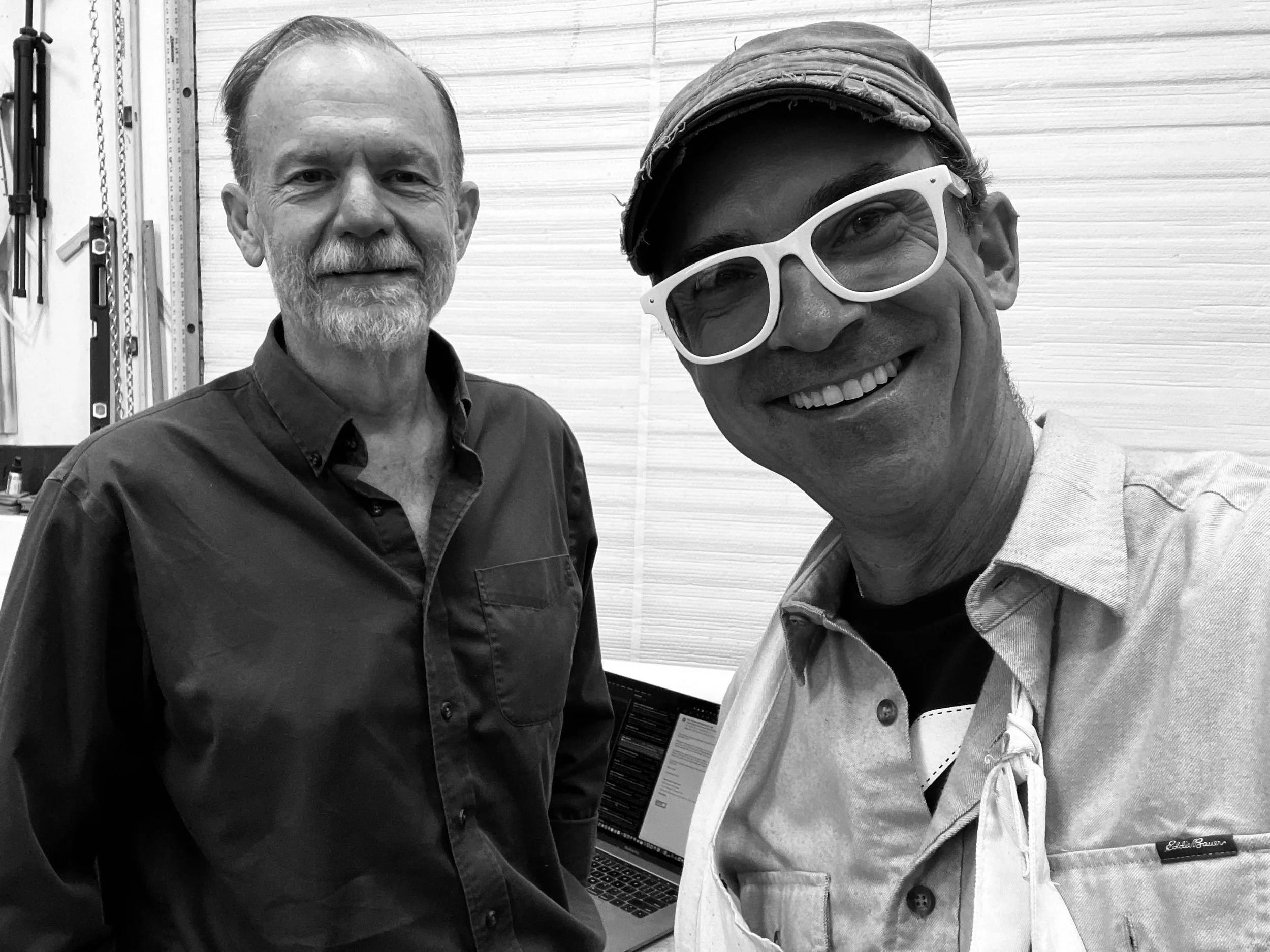 Origami master Robert J. Lang and metal artist Kevin Box stand in Box's studio in Cerrillos, New Mexico.