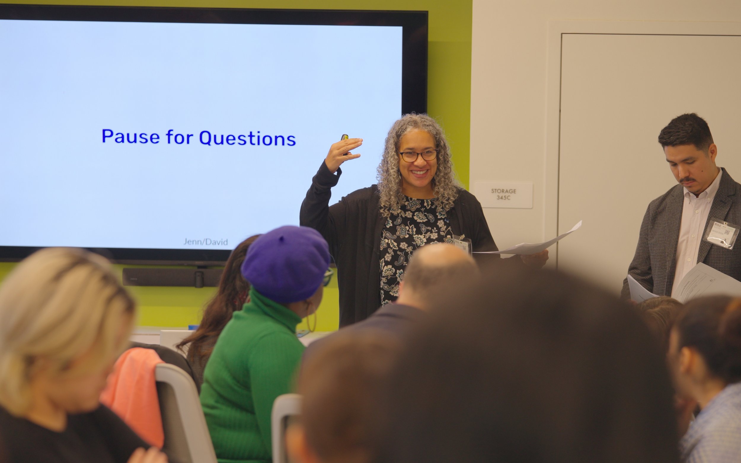 A presenter taking questions from the Co-Design Team