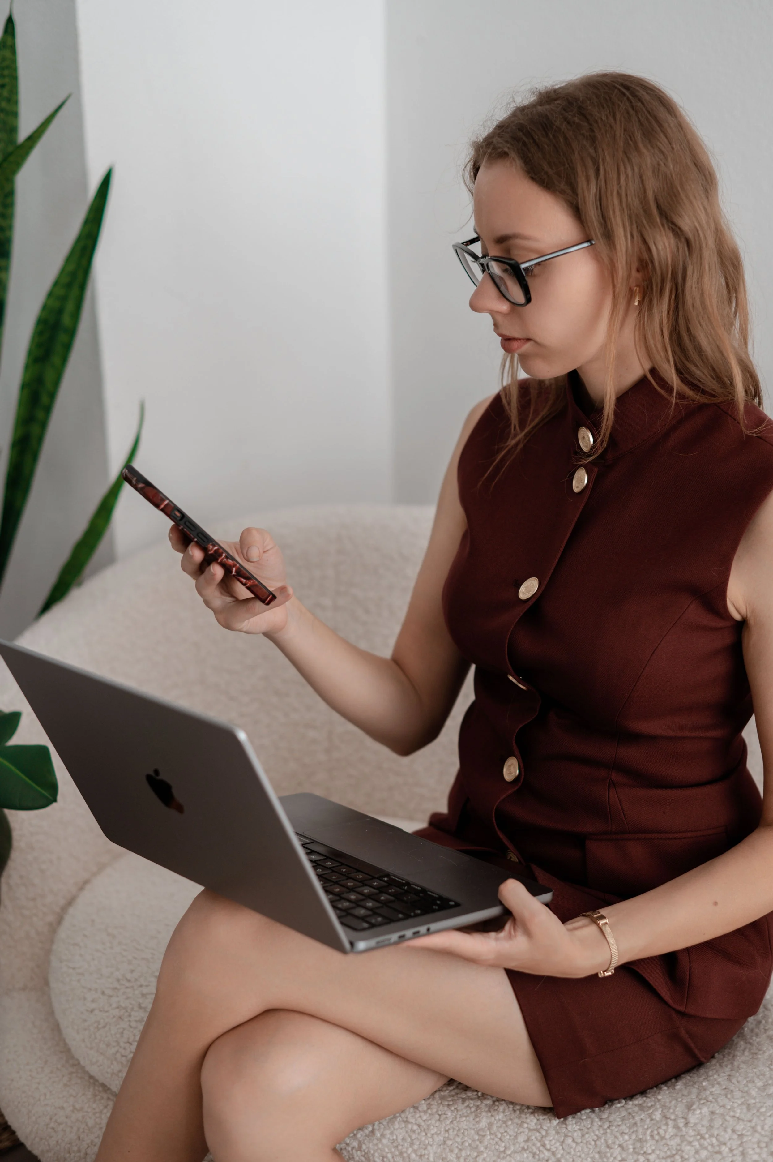 Woman on a laptop working social media