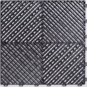 Close-up of a decorative black metal grate with a geometric pattern of diagonal lines forming diamonds and squares.