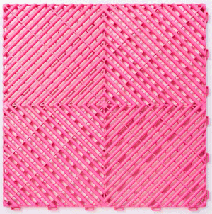 Pink woven mat with geometric pattern