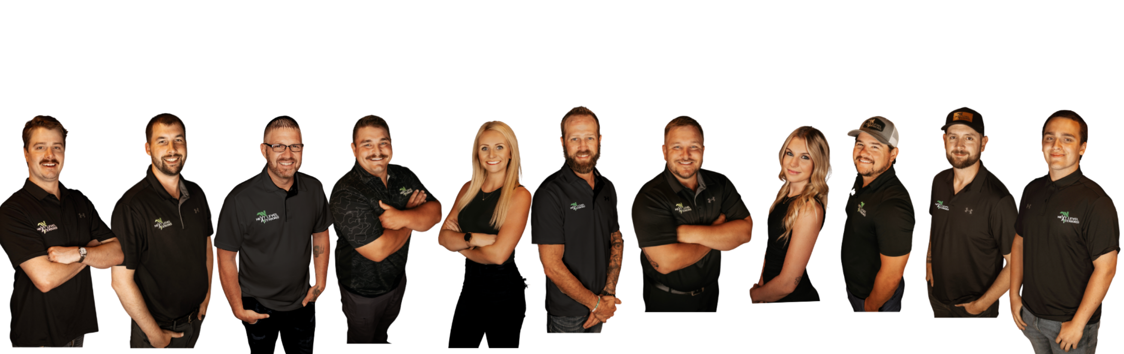 Group of 12 people standing side by side, wearing black shirts with a logo, against a black background.