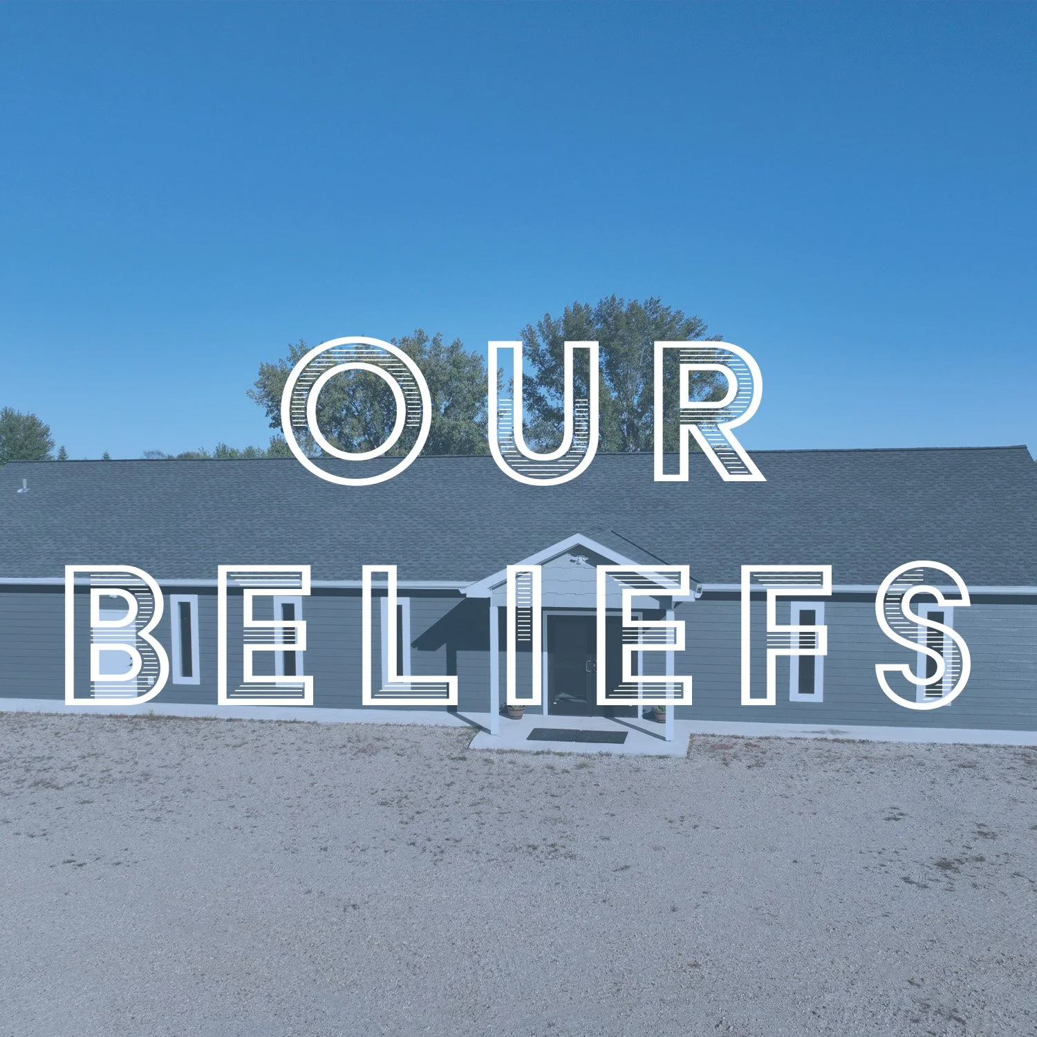 A house with a blue exterior and a dark shingle roof, with large white text overlay reading 'OUR BELIEFS'.