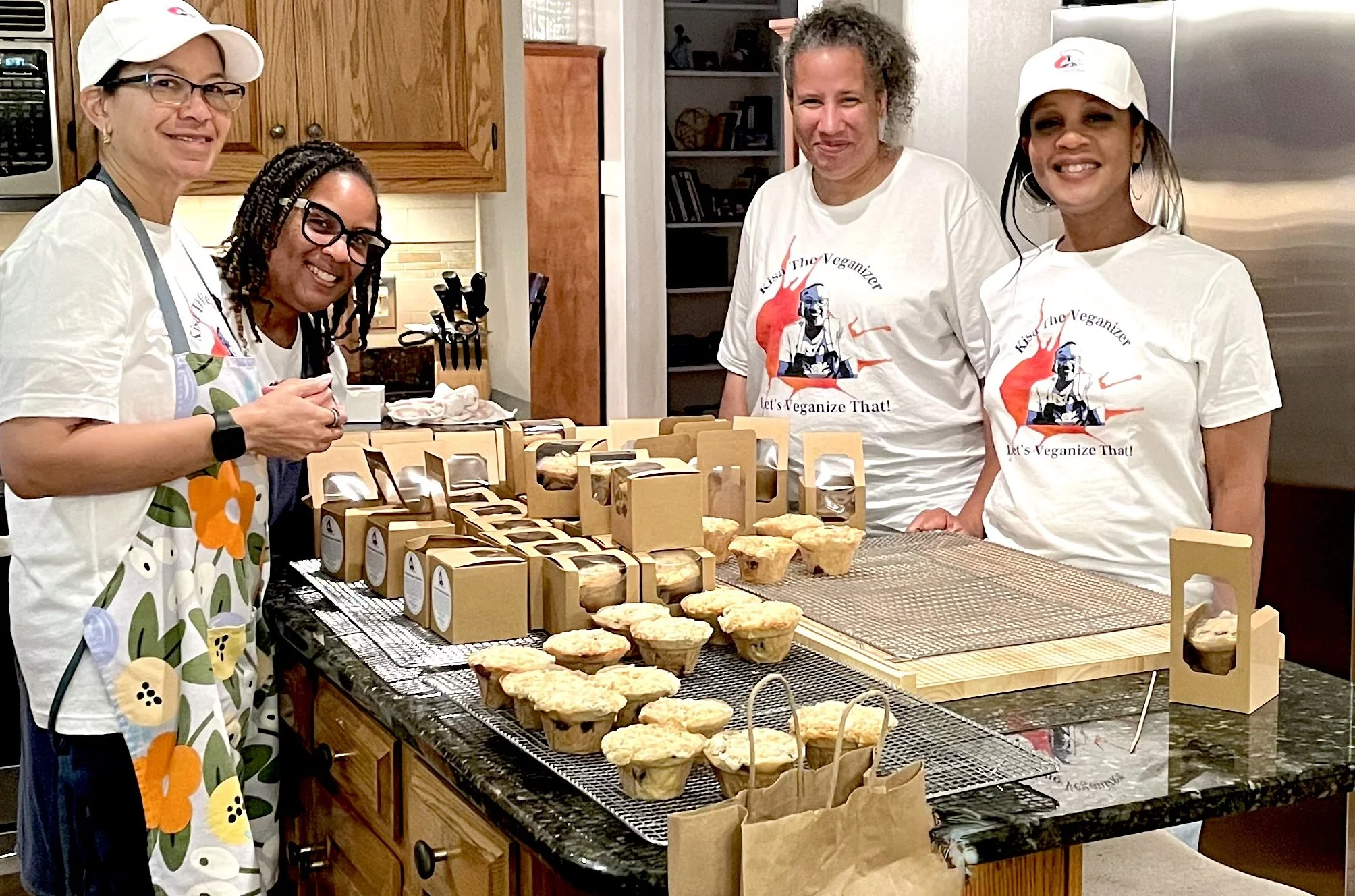 Theresa, Kisa, Gina, and Angela packaging handcrafted vegan goodies for Michigan’s VegFest, sponsored by VegMichigan.