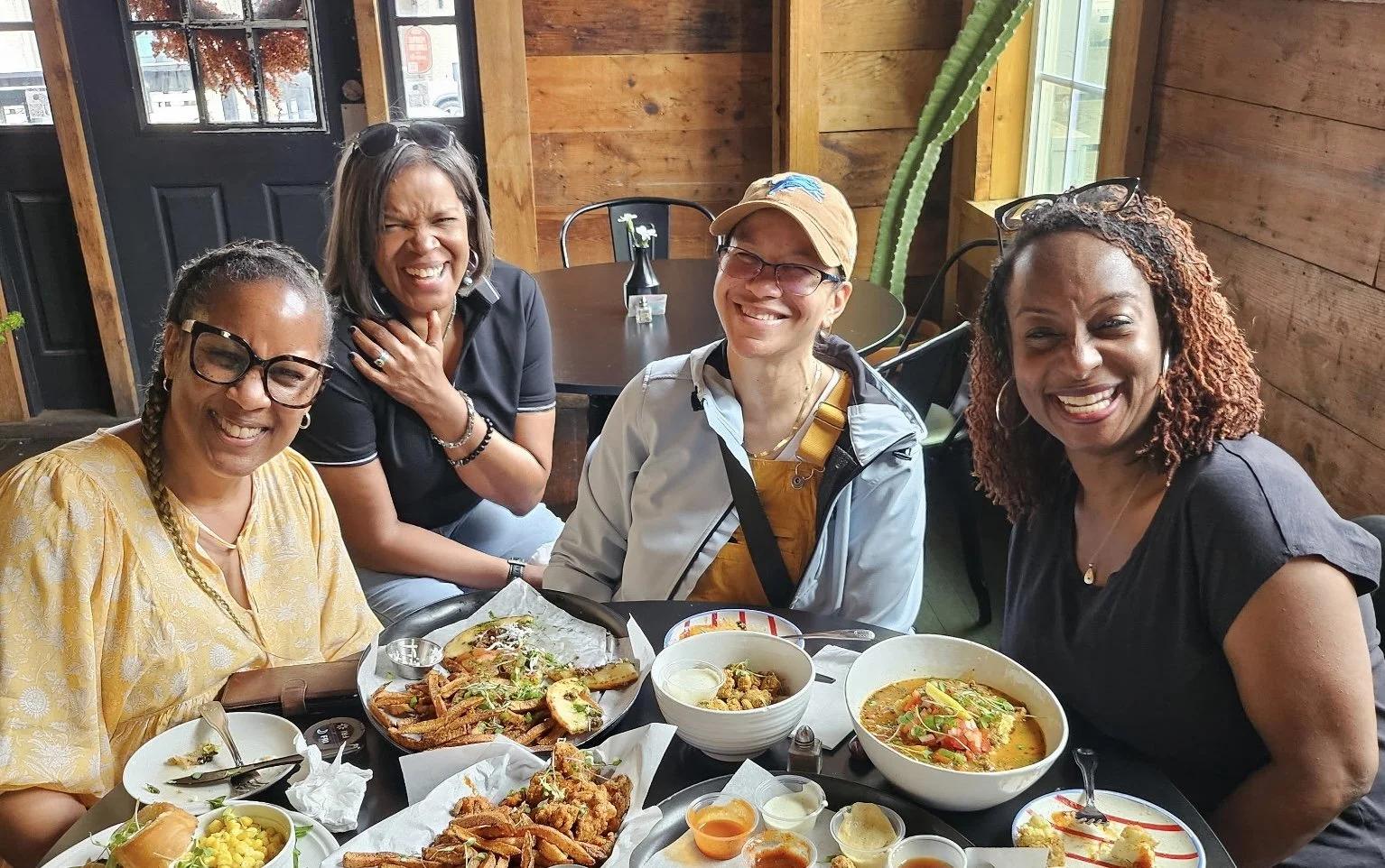 Kisa, Tonya, Theresa, and Brook testing and evaluating a menu in Dallas.
