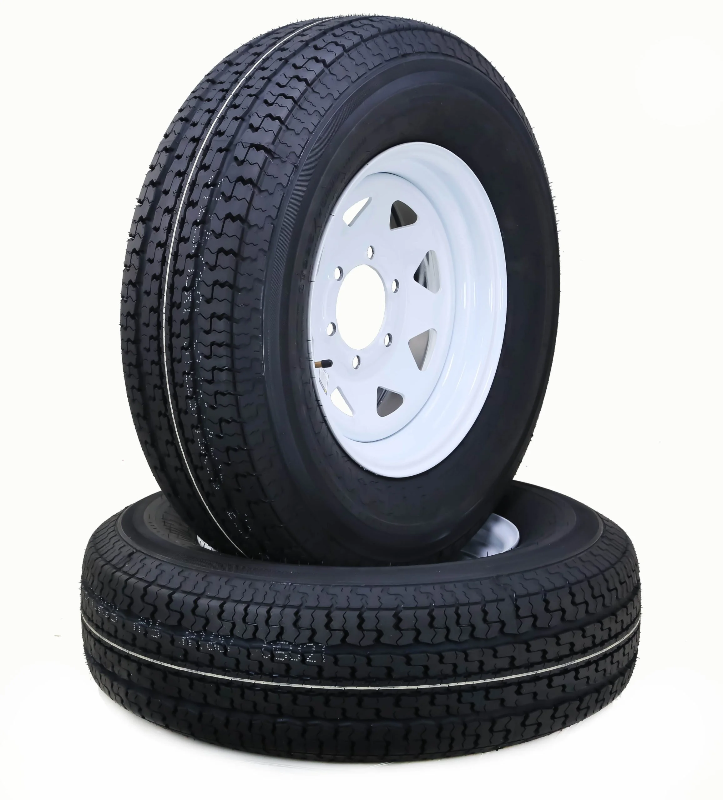 Two black tires with white rims, stacked on a plain white background.