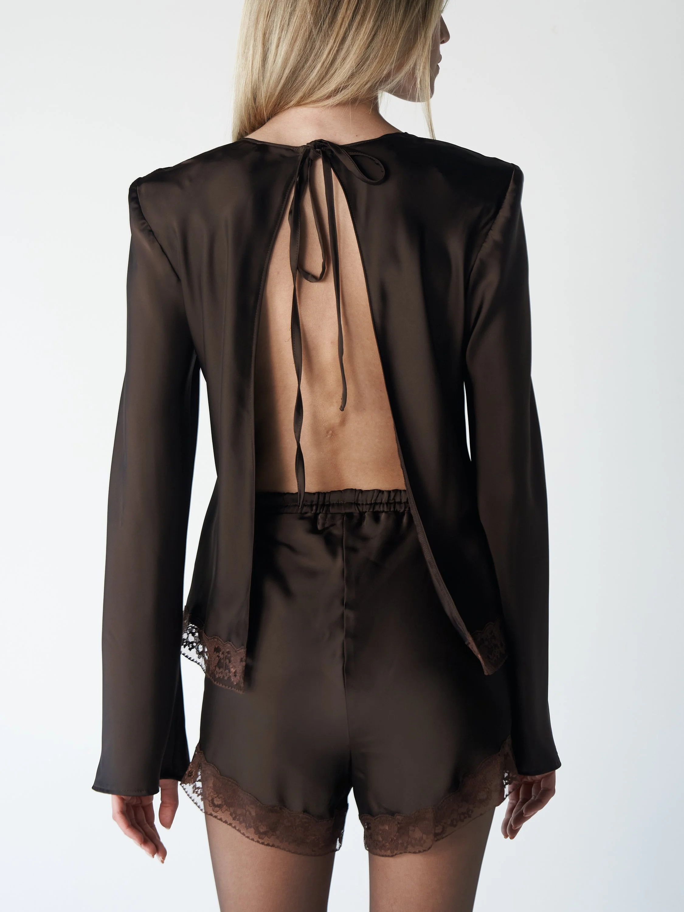 Silk-Feel Open-Back Blouse A study in softness and exposure.