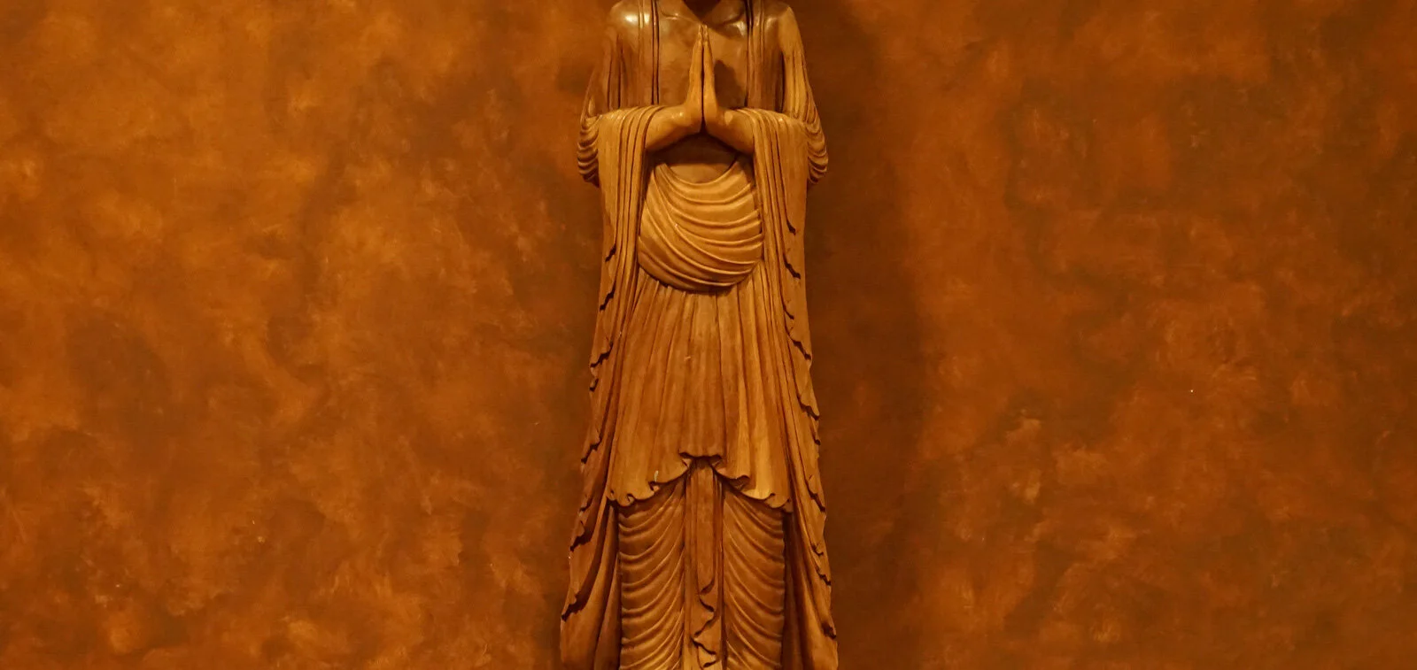 prana-yoga-center-studio-statue-header.jpg