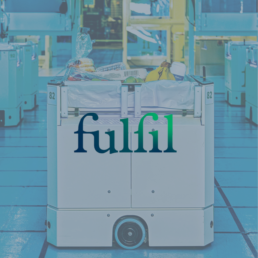 Autonomous delivery robot in a warehouse with food and groceries.