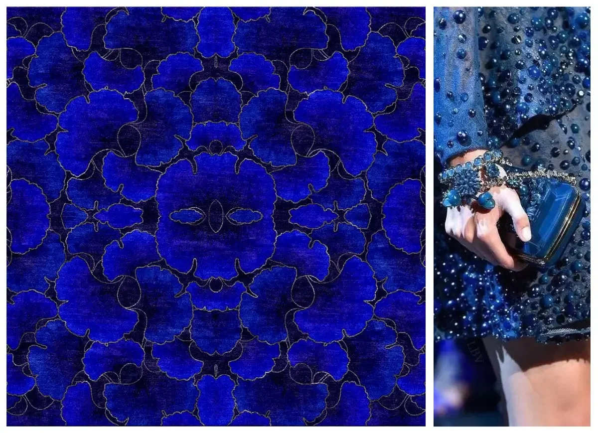 Motif de tissu en bleu foncé avec un motif floral-or en couleur or et un style symétrique à motifs répétés.