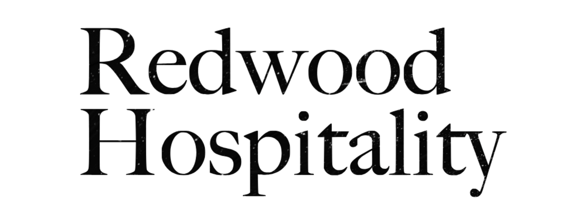 Text reading "Redwood Hospitality" in a large, black font with a slight curve.