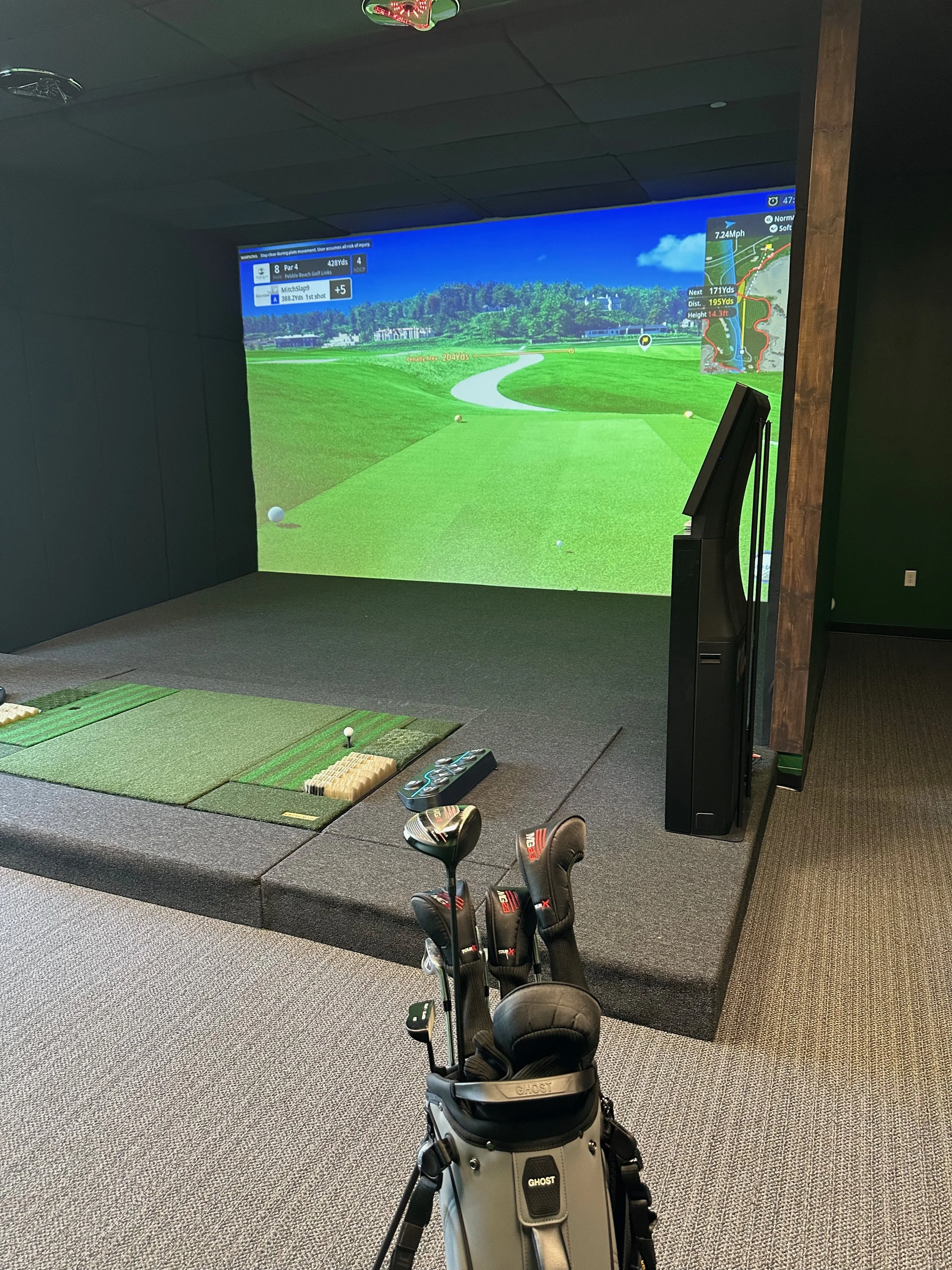 Golf with Mitch and talk marketing strategy at a golf simulator