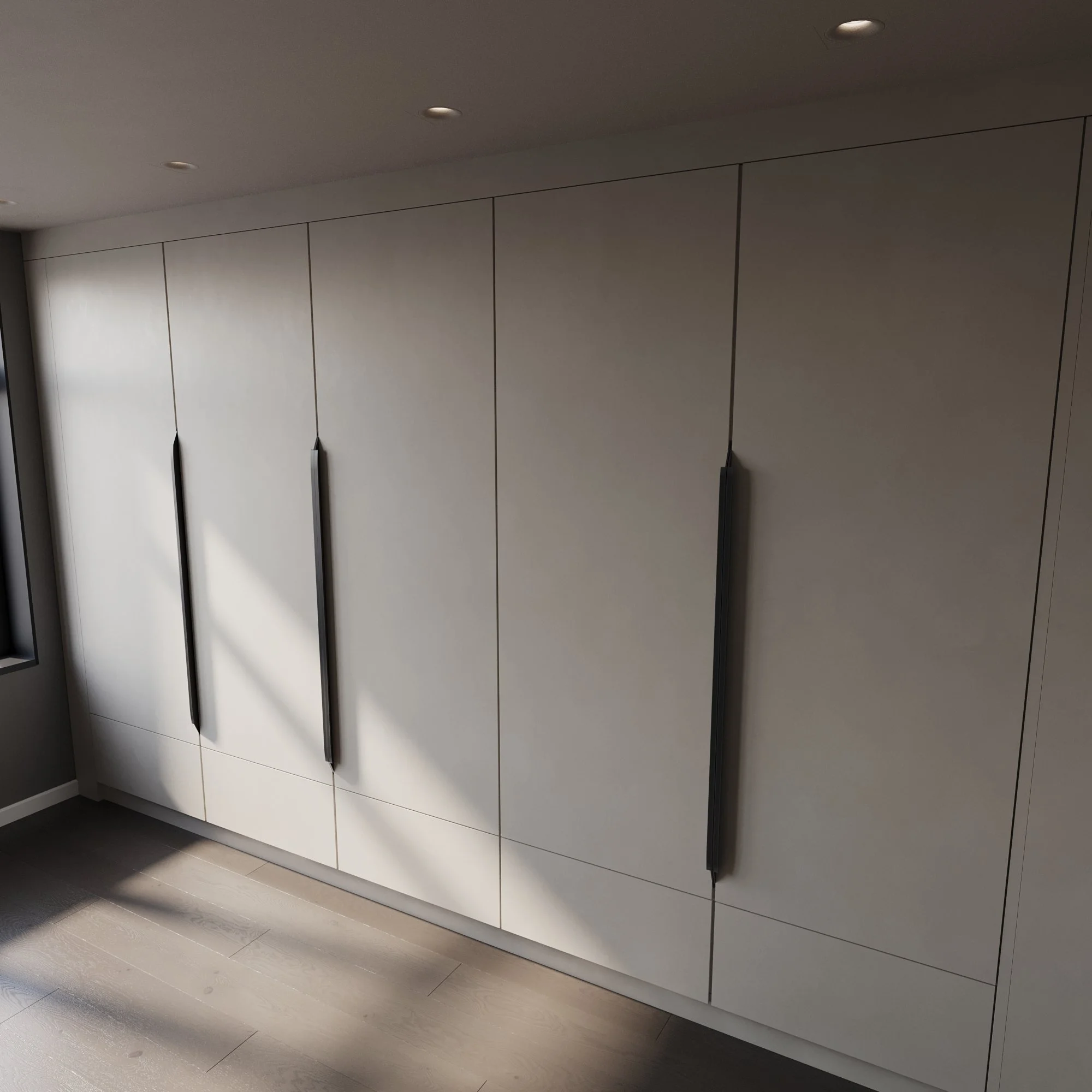 Modern textured wardrobe with black vertical handles and dark wood flooring, sunlight casting shadows. Fitted in London.