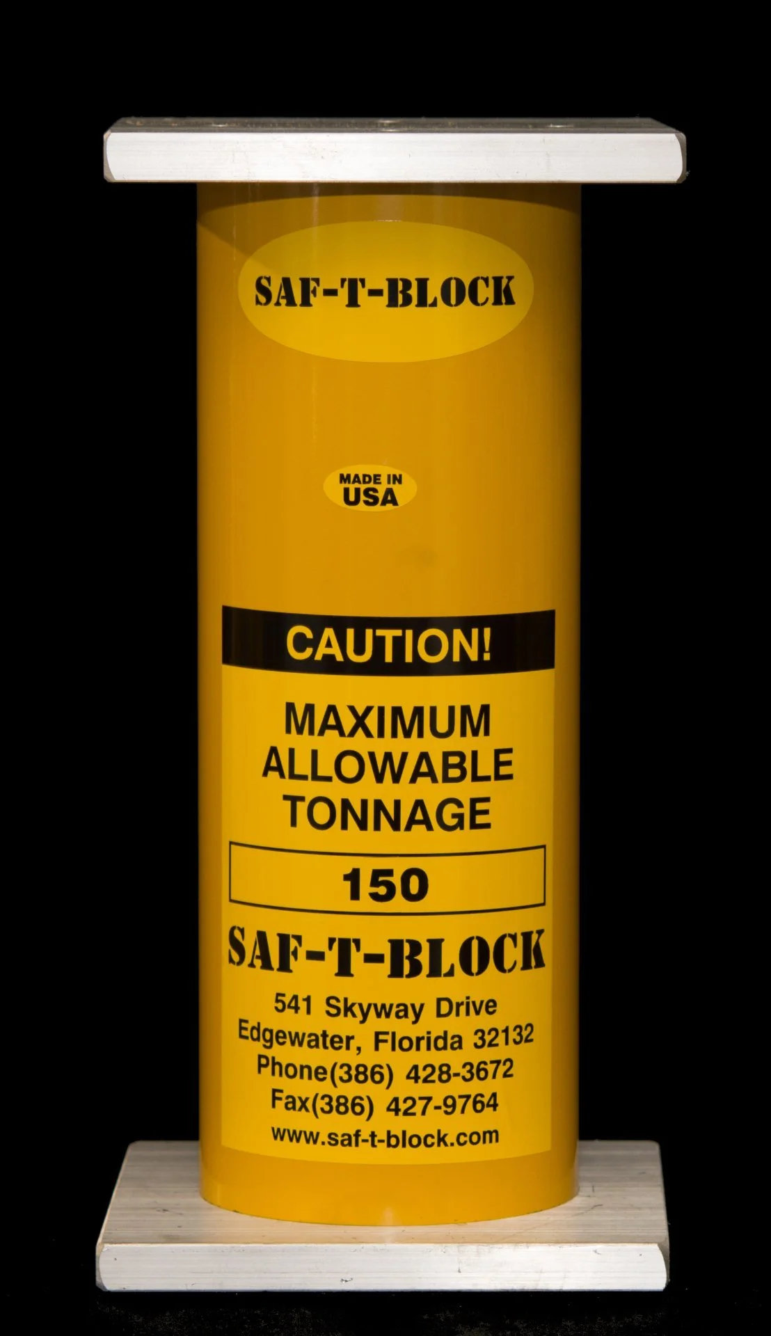 Yellow cylindrical container with labels and contact information, mounted on a wooden base, used for industrial or construction material.