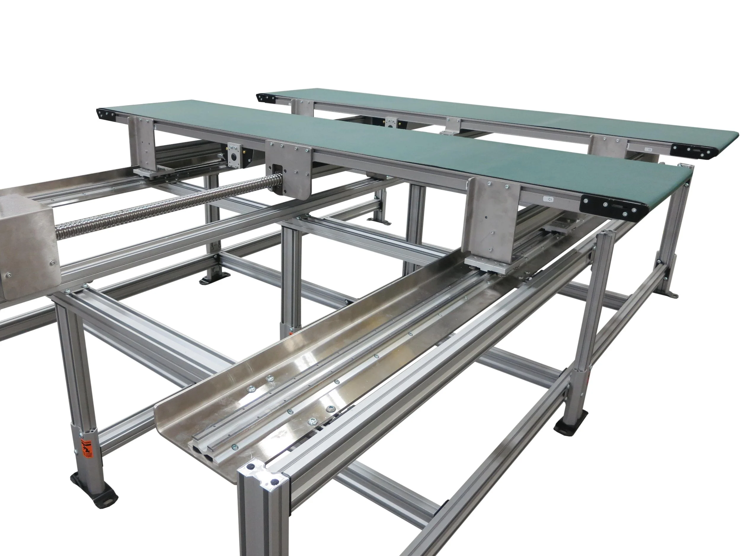 Industrial conveyor belt system with metal frame and green surface for manufacturing or packaging.