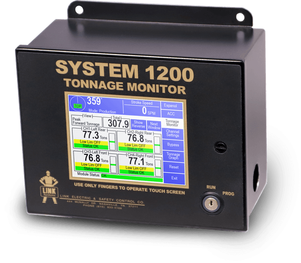 A black electronic device labeled 'System 1200 Tonnage Monitor' with a touchscreen display showing tonnage and related data, manufactured by Link Electric & Safety Control Co.