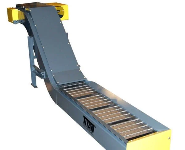 Industrial conveyor belt with metal rollers and yellow end caps