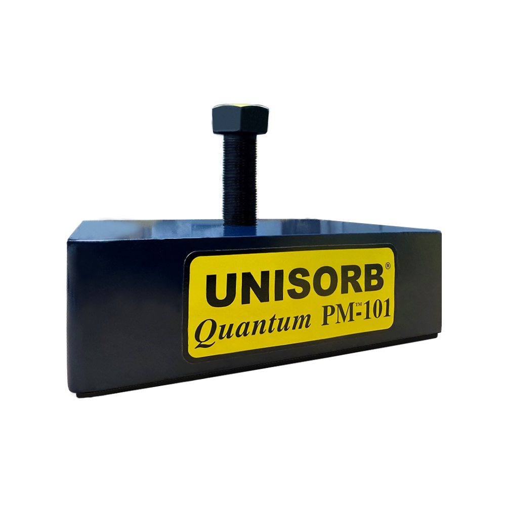 Close-up of a UNISORB Quantum PM-101 industrial equipment component with black and yellow label.