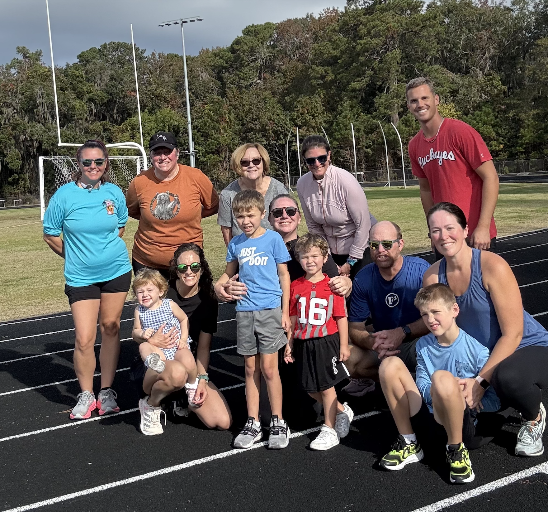 DEGU run club group shot at the track