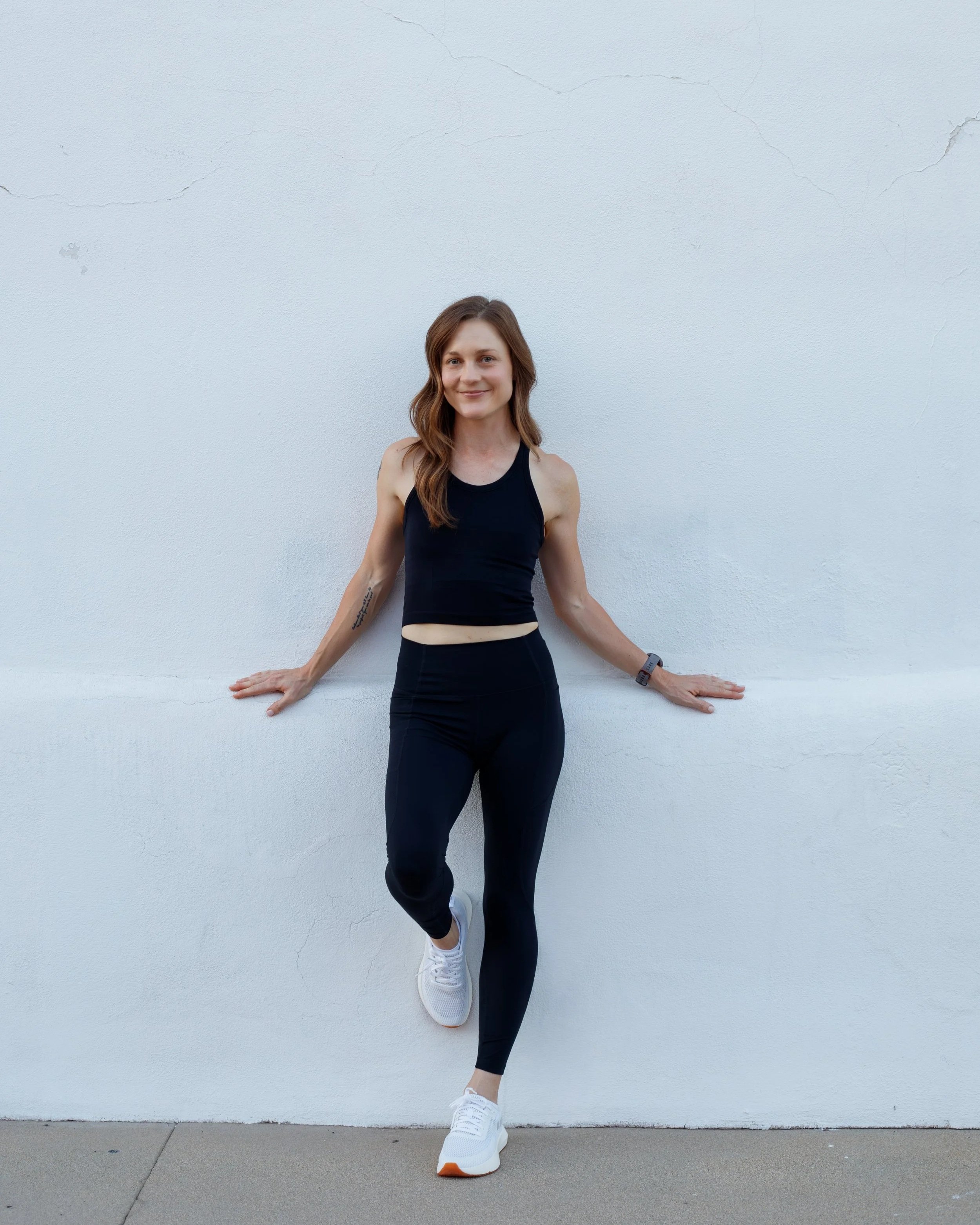 Personal trainer in Tucson helping a client with strength and mobility training